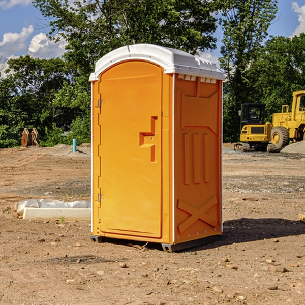 how often are the portable restrooms cleaned and serviced during a rental period in Ozora